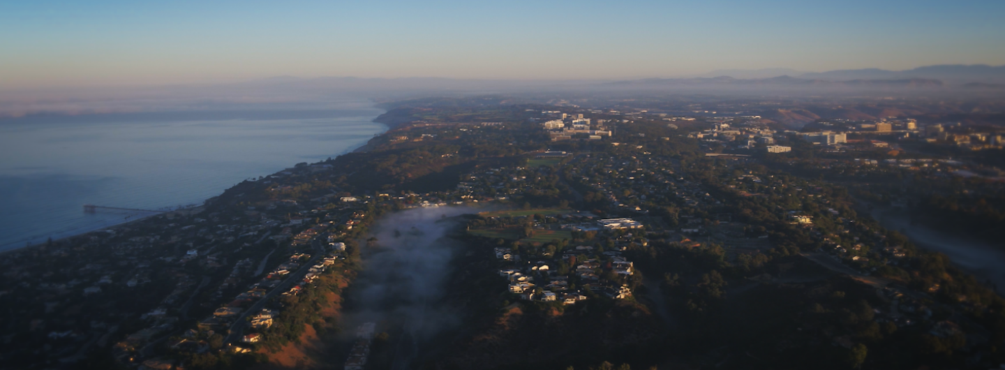 Aerial view of Pacific Ocean and La Jolla and UC San Diego campus with fog
